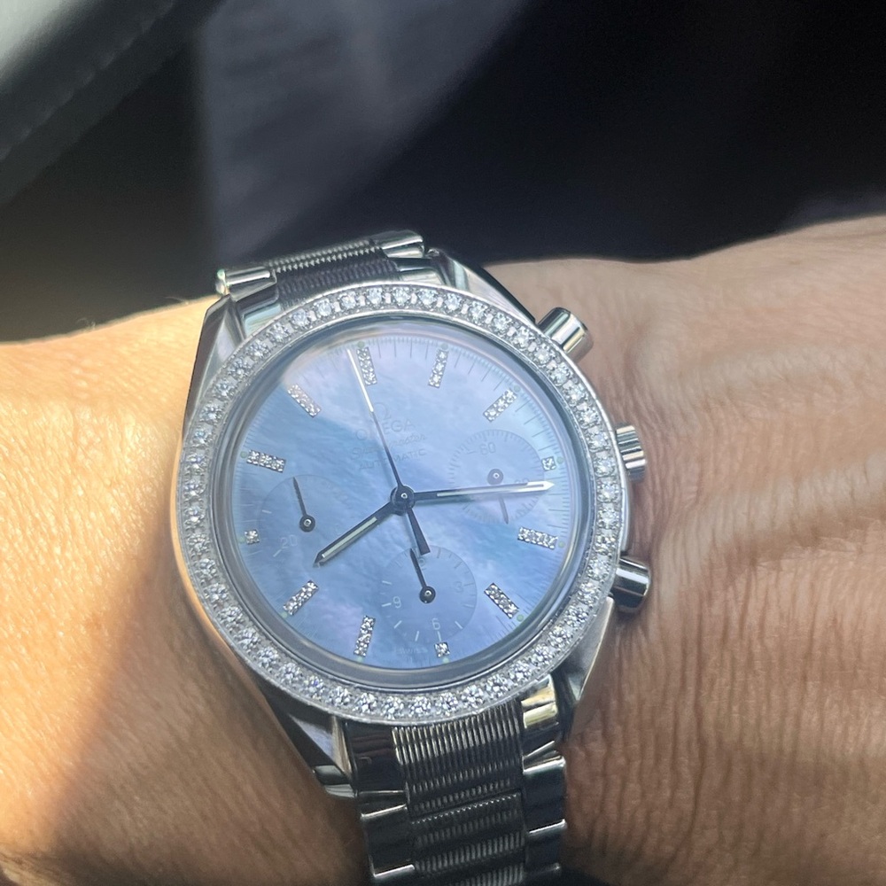 Omega Silver Watch with Diamond Bezel